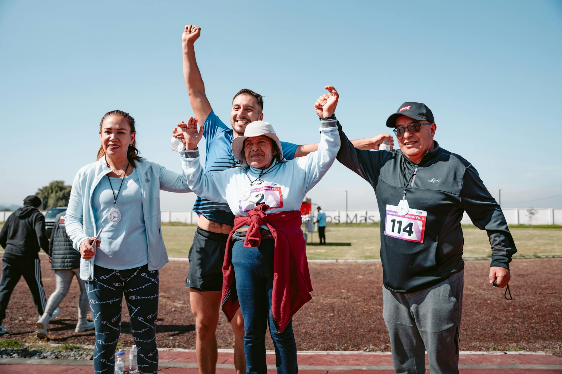smiling people posing after race